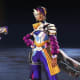 Rampart's legendary 'Soiree Away' skin and the Spitfire skin 'Belle of the Ball' in the Apex Legends Unveiled Collection Event.